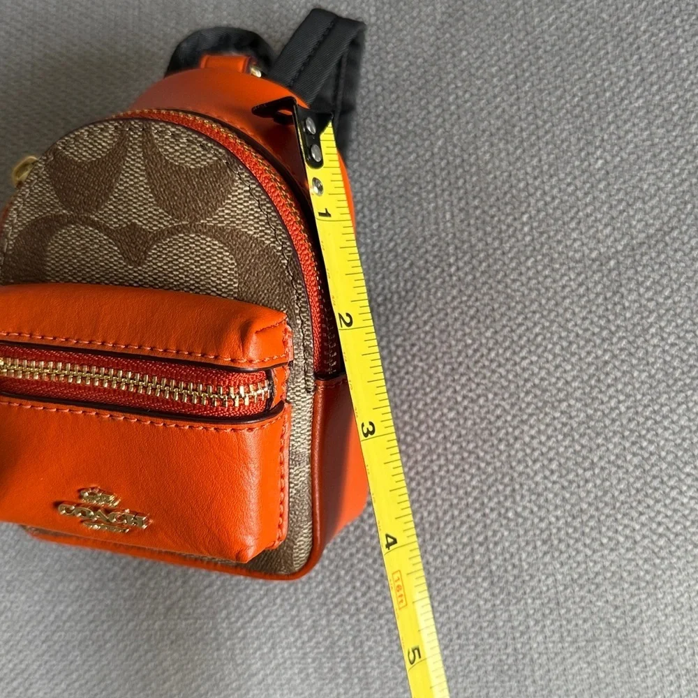 New Coach Mini Court Backpack Bag Charm In Signature Canvas Brown and Orange